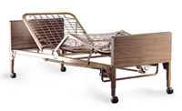 Hospital bed frame pictured on Ryan Pharmacy’s rental information page, without mattress