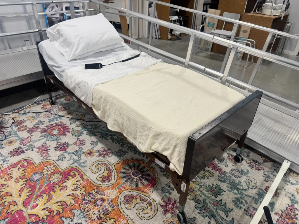 Drive hospital bed photographed in Upward Mobility’s showroom